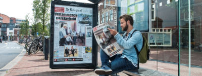 JCDecaux en UM tonen Haarlem voorpagina Telegraaf